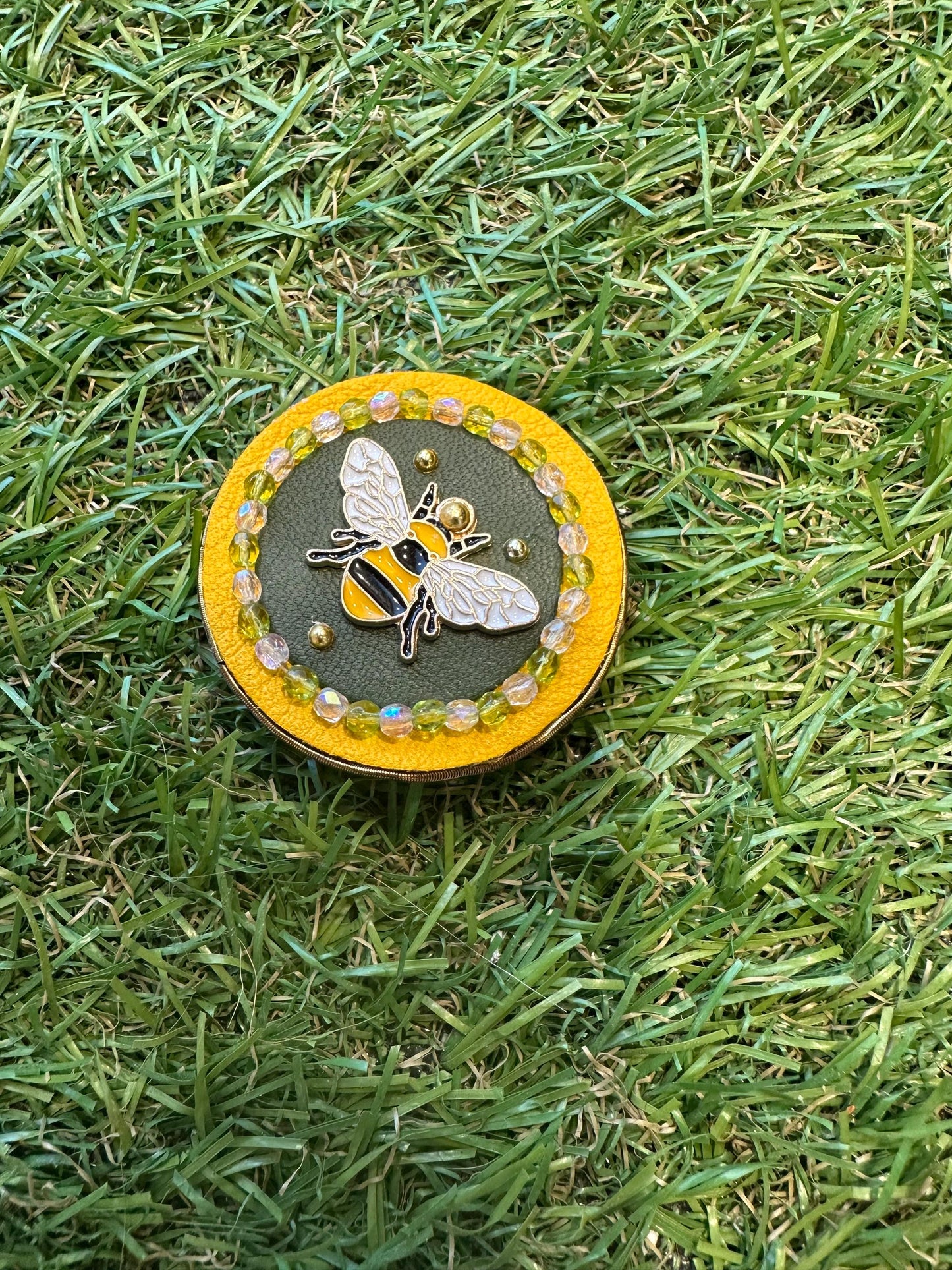 Leather brooch with bee