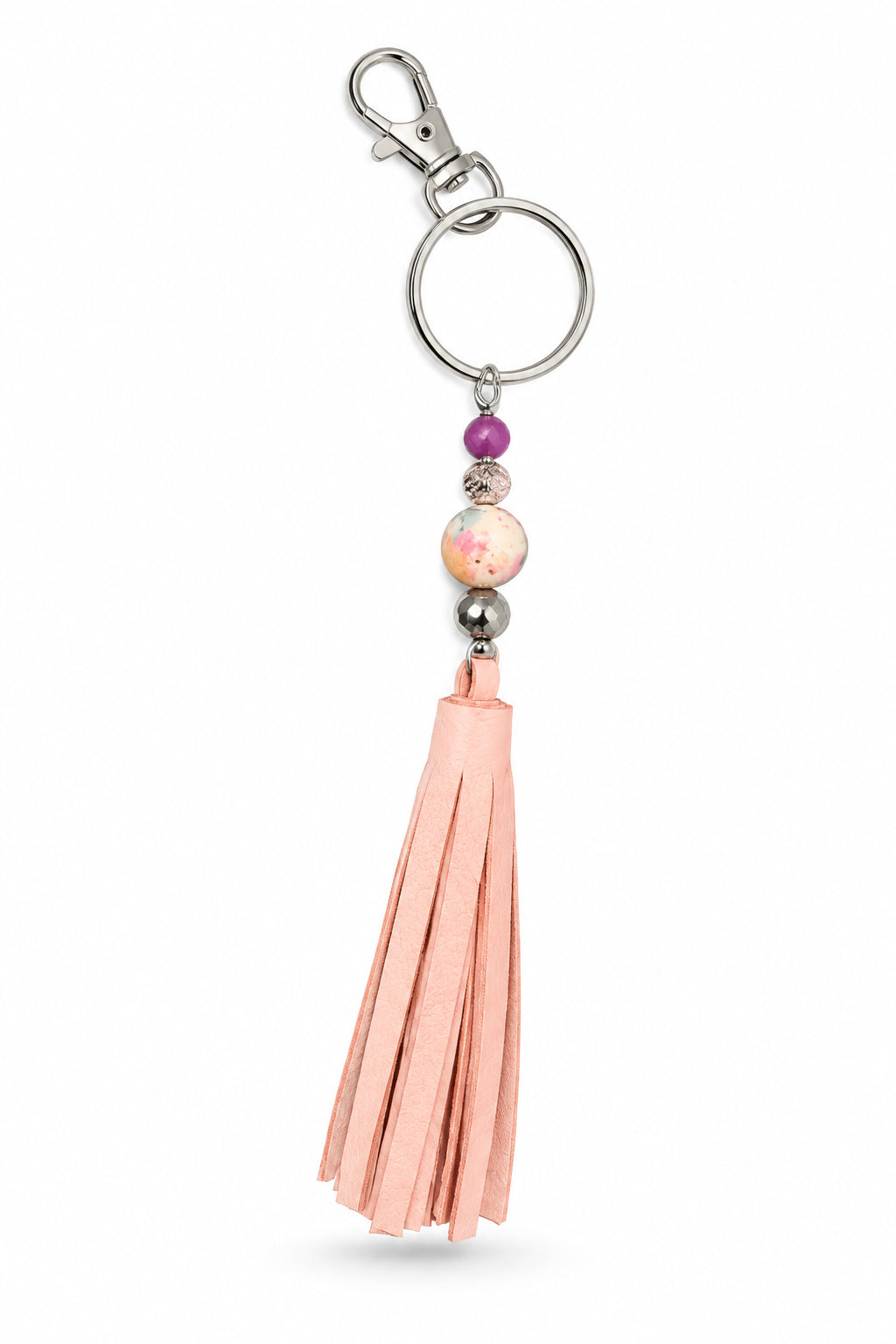 Porte-clés / bijou de sac pompon en cuir rose pâle