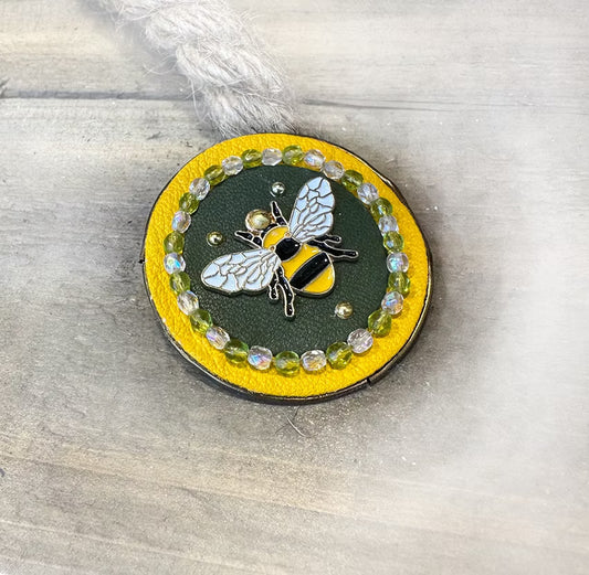 Leather brooch with bee