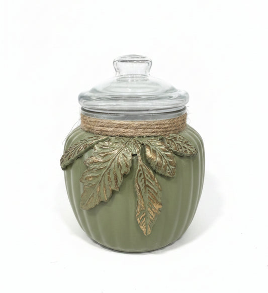 Khaki painted glass jar decorated with foliage