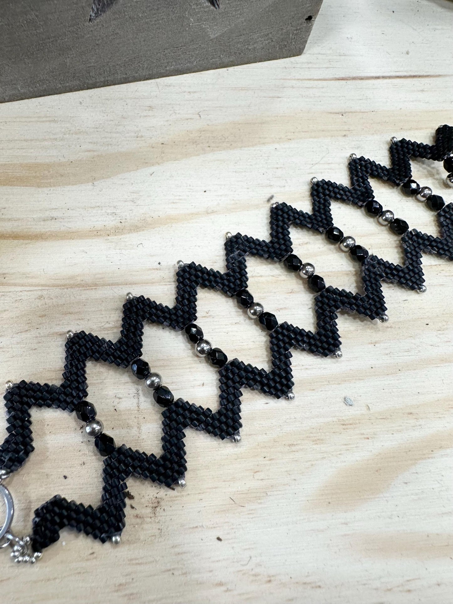 Black zigzag woven cuff with facets