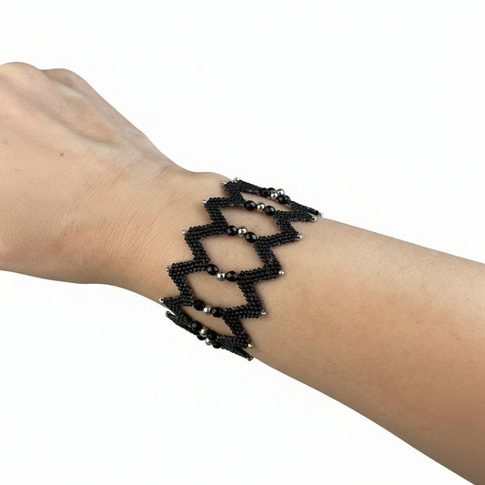 Black zigzag woven cuff with facets